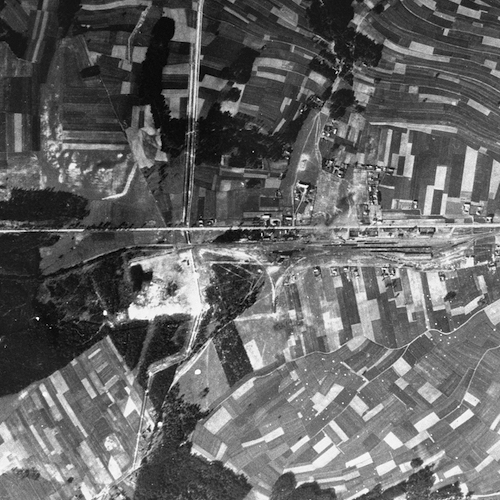 An aerial view of the Belzec area taken by the Luftwaffe during the war, which shows the camp and the rail lines leading to it. Circa 1944. Photo Credit: United States Holocaust Memorial Museum, courtesy of National Archives and Records Administration, College Park